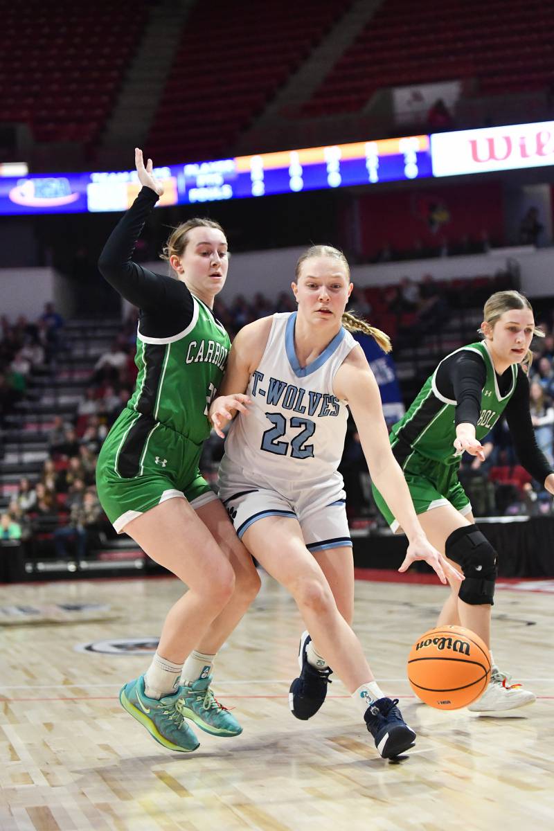 CIssna Park's Josie Neukomm drives to the basket during the Timberwolves' 55-39 loss to Carrollton in the IHSA Class 1A State semifinal on Thursday, March 6, 2025. Cissna Park advances to the third place game on Friday, March 7.