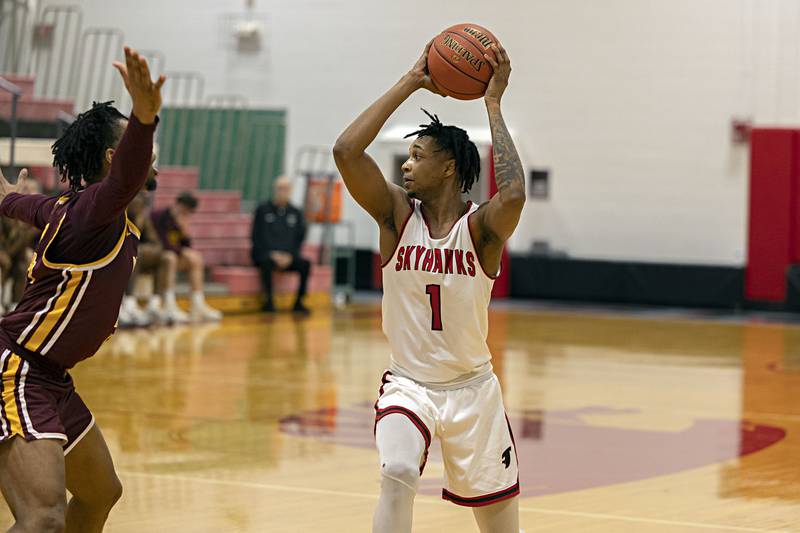 Sauk Valley’s Jaden Clarke looks to pass against Indian Hills Thursday, Jan. 11, 2024 at SVCC.