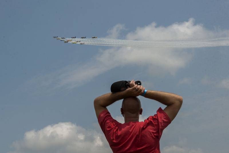 Thirteen pilots fly in formation in planes built from kits. The quick and agile machines are piloted by military trained fliers on Saturday, July 24, 2021 at the ACCA Air Show at Whiteside County Airport.