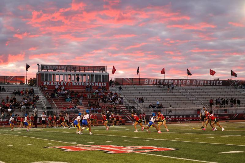 The sun sets behind the stadium at Bradley-Bourbonnais Community High School during the Boilermakers' 60-7 victory over Joliet Central in the season opener on Aug. 25, 2025.