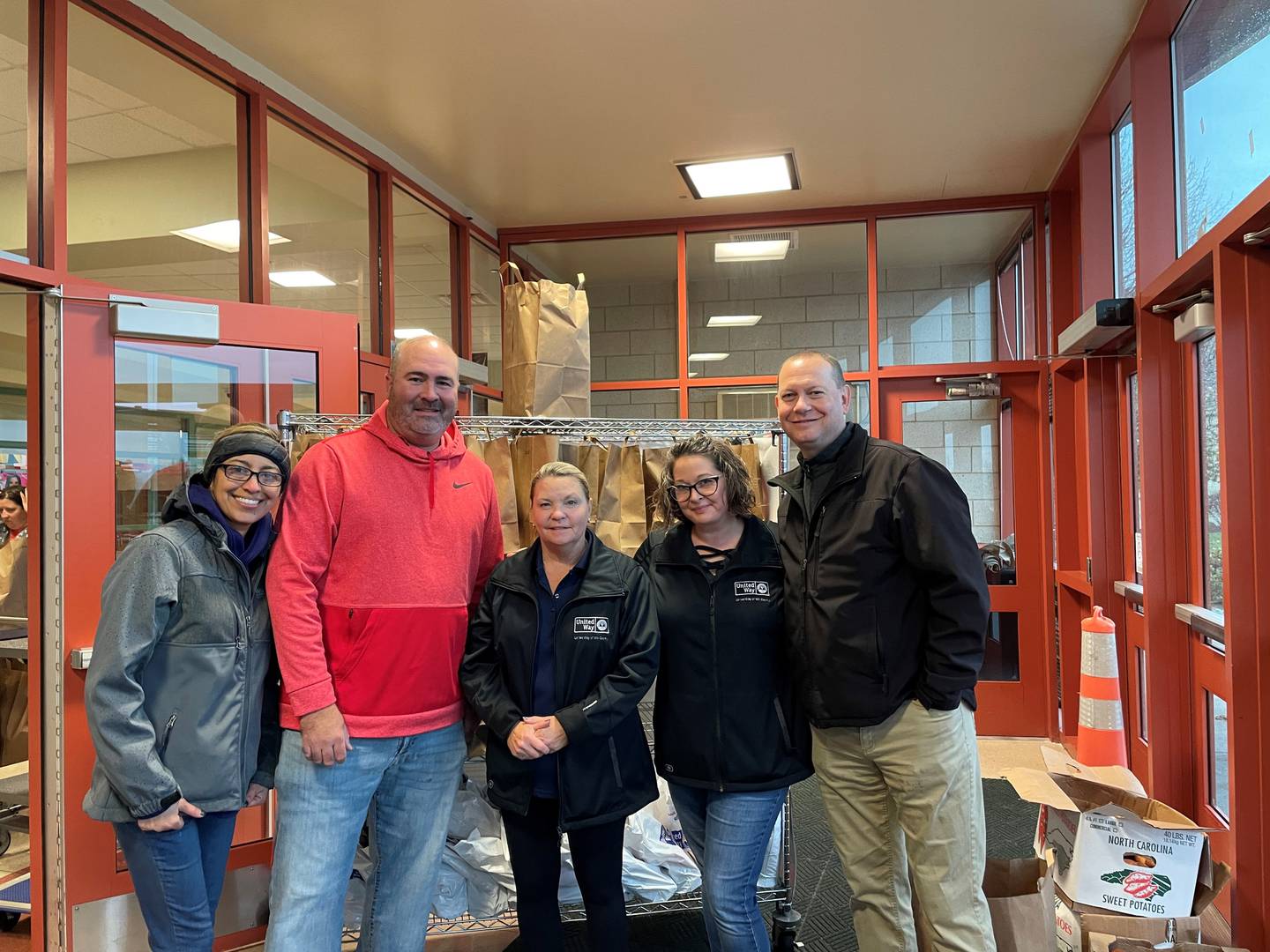 Every dollar donated to Herald-Angels goes directly to United Way of Will County, which partners with 40 organizations and funds 78 programs to help local residents remain healthy, independent, safe and successful.  Pictured, from left, are United Way staff and board members Diana Sorescu, Mike Paone, Kamala Martinez, Sarah Oprzedek, and Billy Hearth.