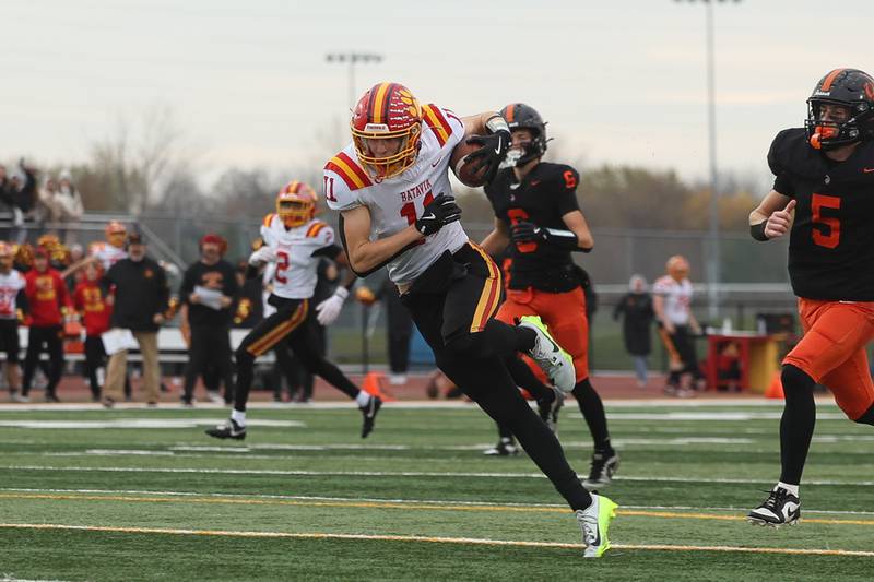 Batavia’s Brett Berggren turns upfield after a catch resulting in the game winning score against Lincoln-Way West on Saturday, Nov. 9, 2024 in New Lenox.