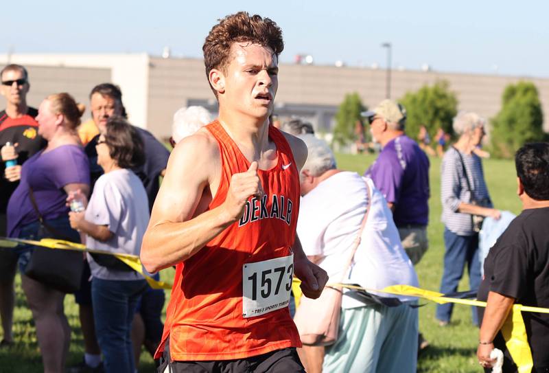 DeKalb's Riley Newport crosses the finish line in first place Tuesday, Aug. 30, 2022, during the Sycamore Cross Country Invitational at Kishwaukee College in Malta.