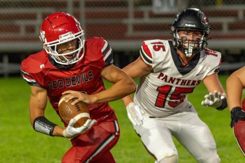 Dylan Glynn (7) of Hall runs ball as Evan Steimle (15) of Erie-Prophetstown trails on Friday, Sept 5, 2025 at Richard Nesti Stadium in Spring Valley.