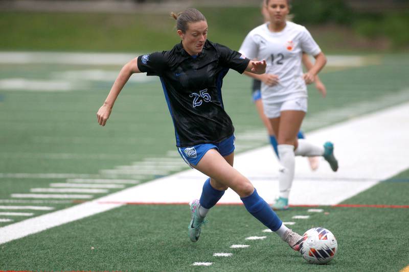 St. Charles North's Kaitlin Glenn goes after the ball during the Class 3A Glenbard West Sectional final against Wheaton Warrenville South on Friday, May 30, 2025 in Glen Ellyn.