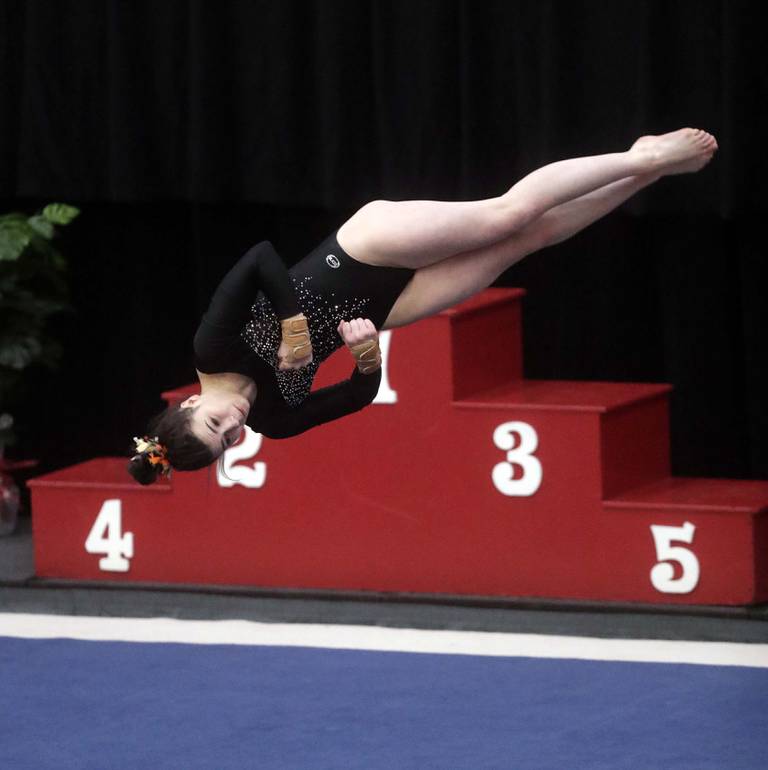 DeKalb’s Annabella Simpson competes in the floor exercise during the IHSA Girls Gymnastics State Finals Saturday February 19, 2022 at Palatine High School.
