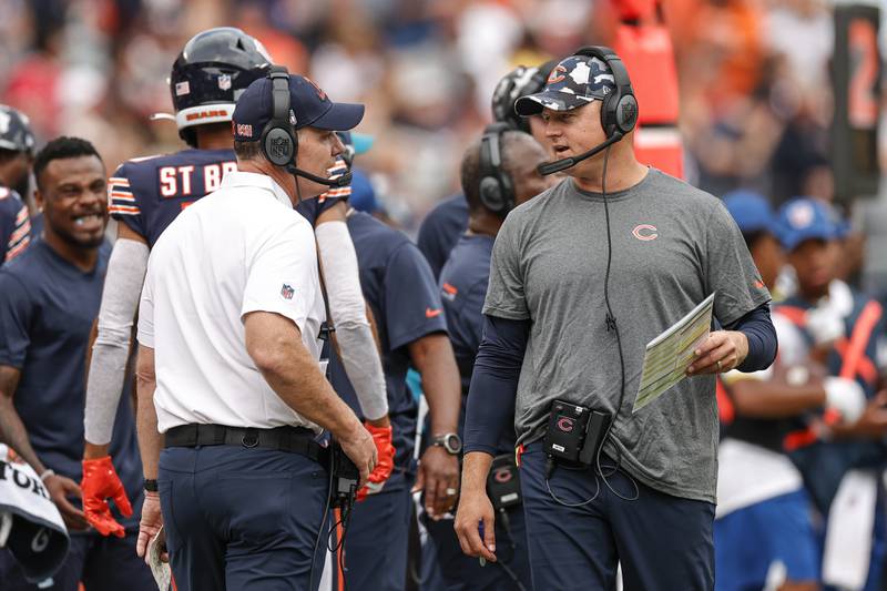 Chicago Bears head coach Matt Eberflus, left, talks with offensive coordinator Luke Getsy, right, during the first half against the Kansas City Chiefs, Saturday, Aug. 13, 2022, in Chicago.