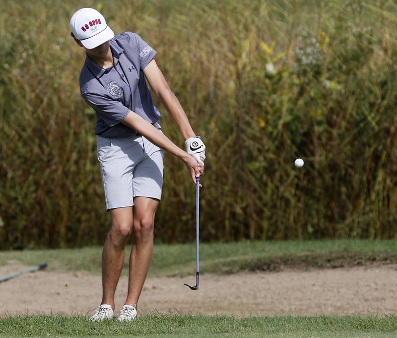 Cary-Grove’s Conner Lentz chips onto  the seventh green during the IHSA Class 2A Crystal Lake South Boys Golf Regional on Wednesday, Oct. 1, 2025 at RedTail Golf Club in Lakewood.