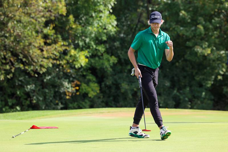 Bishop McNamara's Braylon Ricketts celebrates making a putt during the IHSA Class 1A Kankakee (McNamara) Regional at the Kankakee Elks Country Club on Wednesday, Oct. 1, 2025. Payne would finish sixth overall with a score of 85 to help the Fightin' Irish team claim the regional title for the first time since 2010.