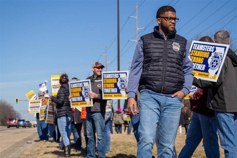 Members of the Teamsters Local 916 union rally Wednesday outside of the Illinois Department of Transportation building in Springfield. Unions representing about 3,800 state highway workers have authorized strikes as contract negotiations between them and the IDOT continue.