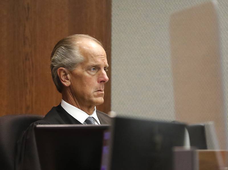 McHenry County Judge Michael Coppedge listens to the defense's opening statement in William Bishop’s bench trial on Monday, Oct. 17, 2022, in the McHenry County courthouse in Woodstock.