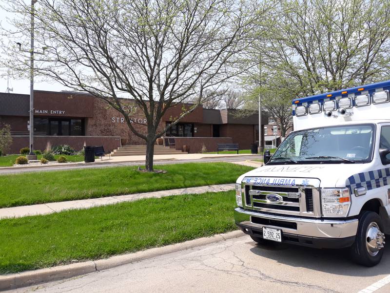 An Advanced Medical Transport ambulance parked in front of Streator City Hall on Tuesday, May 10, 2022, as its personnel attended a City Council Committee of the Whole meeting to discuss the future of emergency ambulance service in the community.