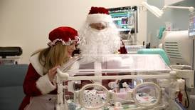 Photos: Santa and Mrs. Claus visit babies at Northwestern Medicine Central DuPage Hospital