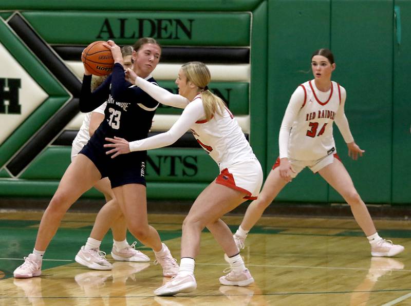 Cary-Grove's Elizabeth Mjaanes protects the basketball as she is guarded by Huntley's Anna Campanelli during the girl’s game of McHenry County Area All-Star Basketball Extravaganza on Sunday, April 13, 2025, at Alden-Hebron’s Tigard Gymnasium in Hebron.