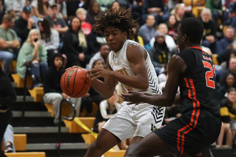 Joliet West’s Aamkr Shannon drives to the paint against Plainfield East on Friday, Dec. 8th, 2023 in Joliet.