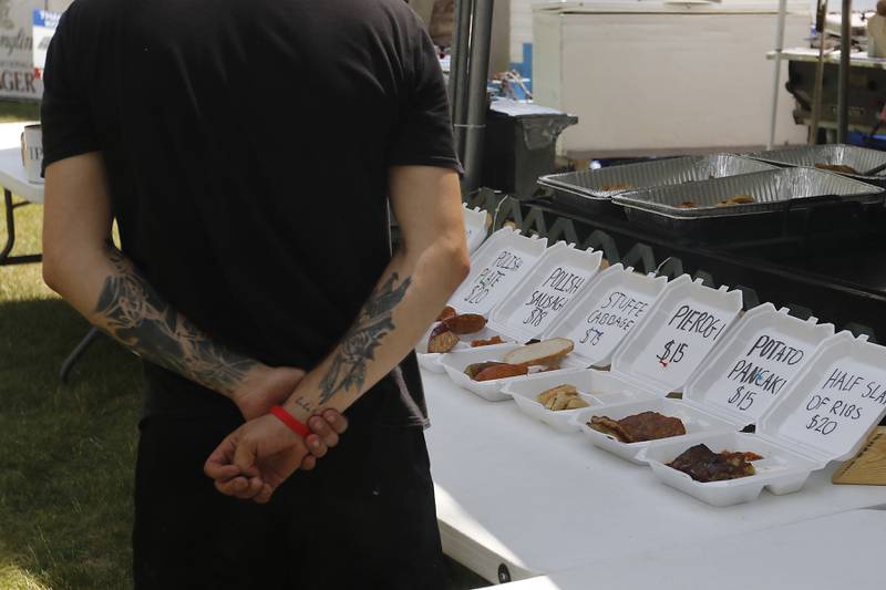 A customer checks out the food selection at the Lakeside Festival on Thursday, July 3, 2025, on the grounds of the historic Dole Mansion in Crystal Lake,