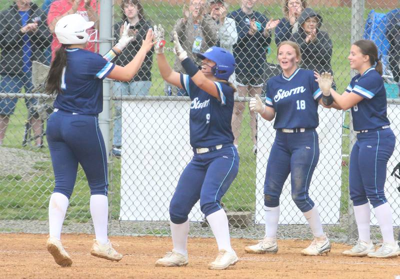 Bureau Valley players (from left) Madison Smith, Emily Wright, Kadyn Haage and Carly Reglin react after defeating Erie-Prophetstown during the Class 1A Regional game on Monday, May 13, 2024 at Bureau Valley High School.