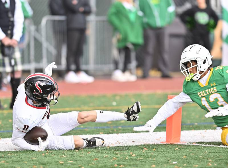 Springfield's Kale Thurman (11) catches a pass for a touch down during the class 5A first round playoff game against Providence Catholic on Saturday, NOV. 01, 2025, at New Lenox.