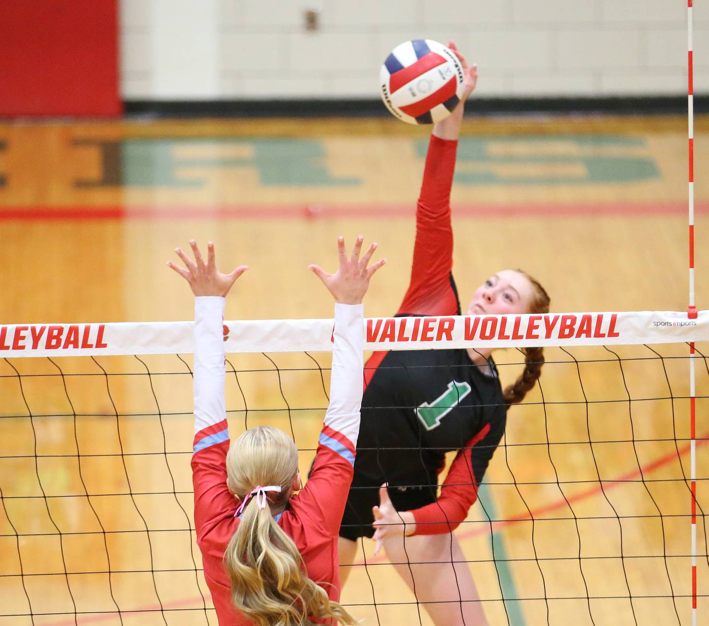 L-P's Addison Duttlinger sends a spike past Ottawa's Ella Damron on Tuesday, Oct. 17, 2023 at Sellett Gymnasium.