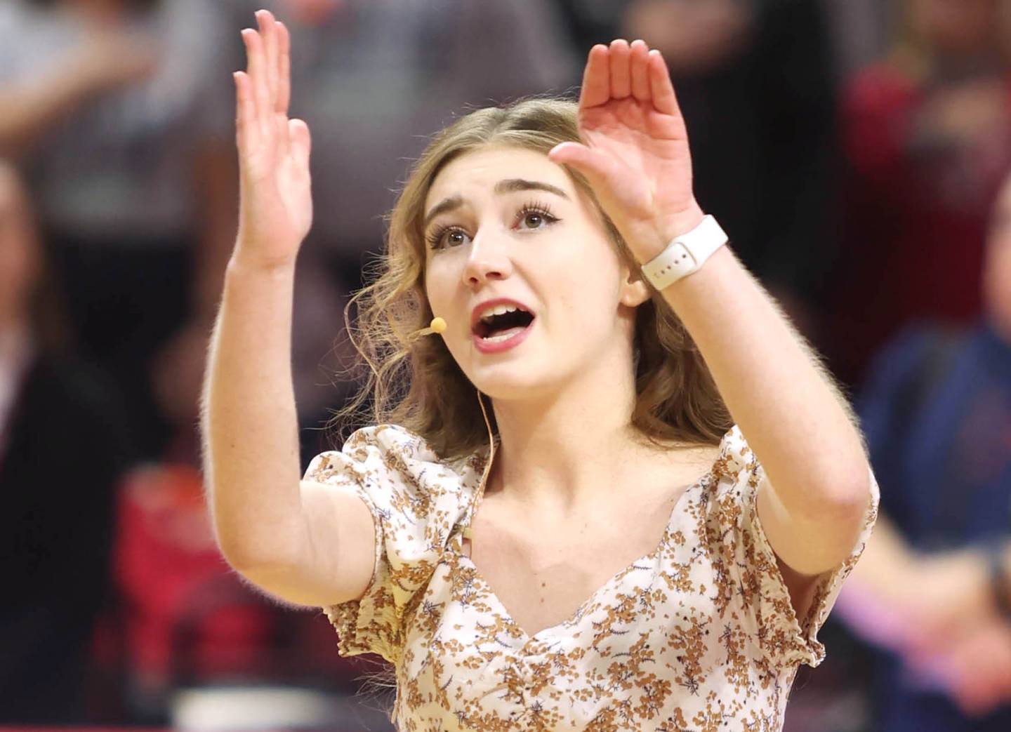 Rock Falls sophomore Remington Collins sings and signs the National Anthem before the Class 4A state semifinal girls basketball game Friday, March 4, 2022, in Redbird Arena at Illinois State University in Normal.