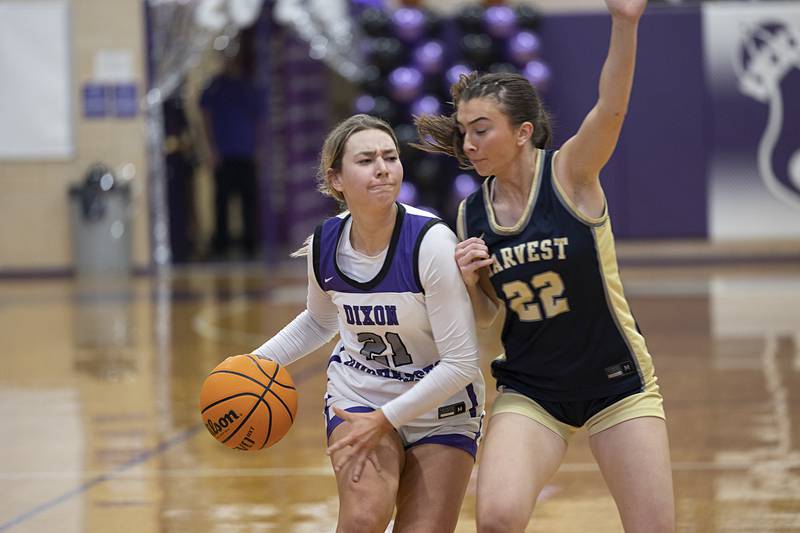 Dixon’s Reese Dambman works against Harvest-Westminster’s Colbie Canning Wednesday, Feb. 11, 2026.