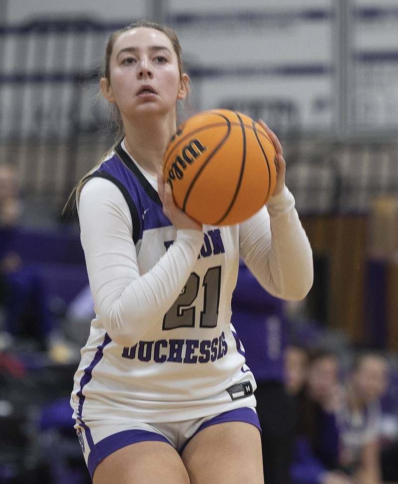 Dixon's Reese Dambman spots up to shoot against Morris Friday, Jan. 3, 2025, at Dixon High School.