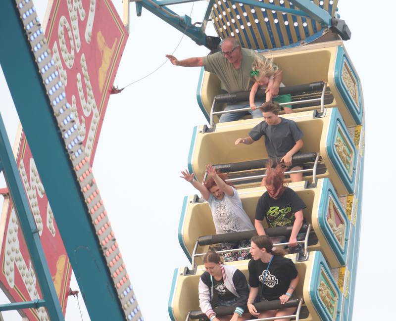 People ride Pharaohs Fury at the Lions Club Carnival on Thursday, June 15, 2023 in Ottawa.