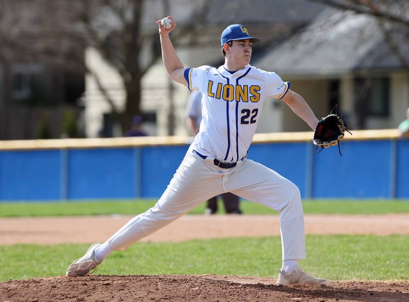 Lyons Township's Brady Chambers (22) pitches during the boys varsity baseball game between Lyons Township and Downers Grove North high schools in Western Springs on Tuesday, April 11, 2023.