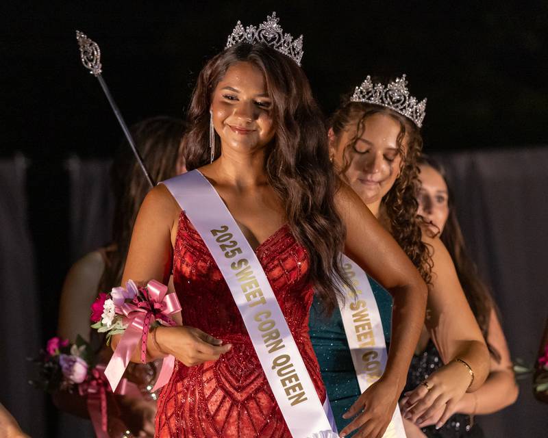 Crystal Garcia is crowned the 2025 Mendota Sweet Corn Queen and receives her sash placed on by 2024 queen Madelyn Becker on August 8, 2025 in Mendota.