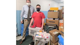 Troy student donates 3,000 school supply items to all 7 Troy schools