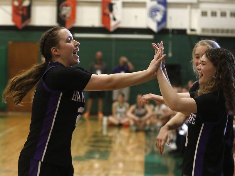 Hampshire's Whitney Thompson high fives here teammates after winning the girl’s three-point contest of McHenry County Area All-Star Basketball Extravaganza on Sunday, April 14, 2024, at Alden-Hebron’s Tigard Gymnasium in Hebron.