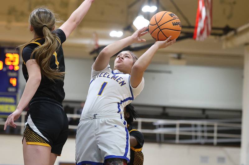 Joliet Central’s Elliana Fowler takes a fade away shot against Joliet West on Thursday, Jan. 15, 2026 in Joliet.