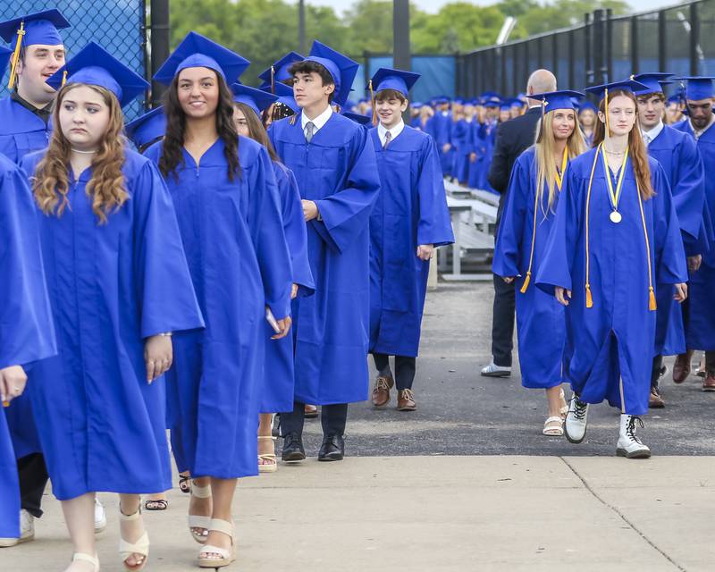 Students march onto the field at the Lyons Township High School Graduation ceremony Wednesday, May 28, 2025  in Western Springs.