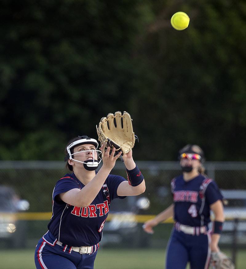 Belvidere North’s Alexa Norgard eyes a pop-up against Dixon Tuesday, May 27, 2025.