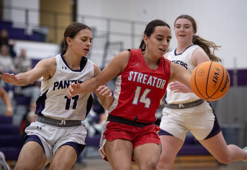 Streator's Isabel Gutierrez controls the ball as Manteno's Peyton Boros guards in a game on Monday, December 8, 2025.