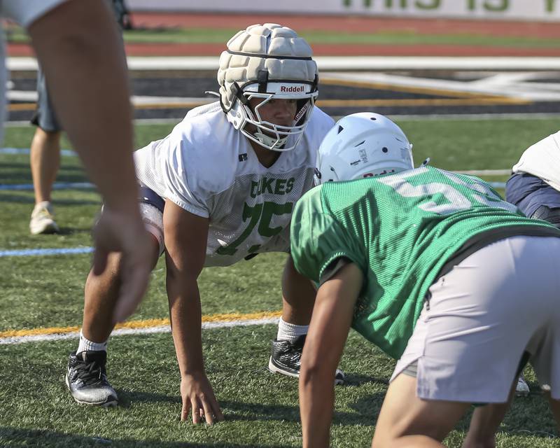 Costa Kampas gets in his stance during one on one blocking drills at York High School football practice, Thursday, Aug 14, 2025  in Elmhurst.