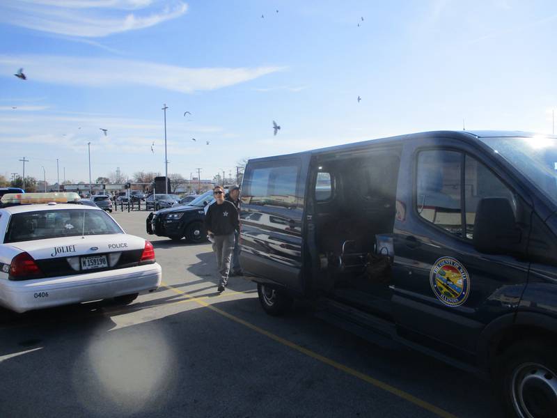 Joliet police and the Will County Coroner's were in the parking lot outside a Planet Fitness center at Jefferson Street and Larking Avenue where a body was found on Sunday, Nov. 5, 2023,