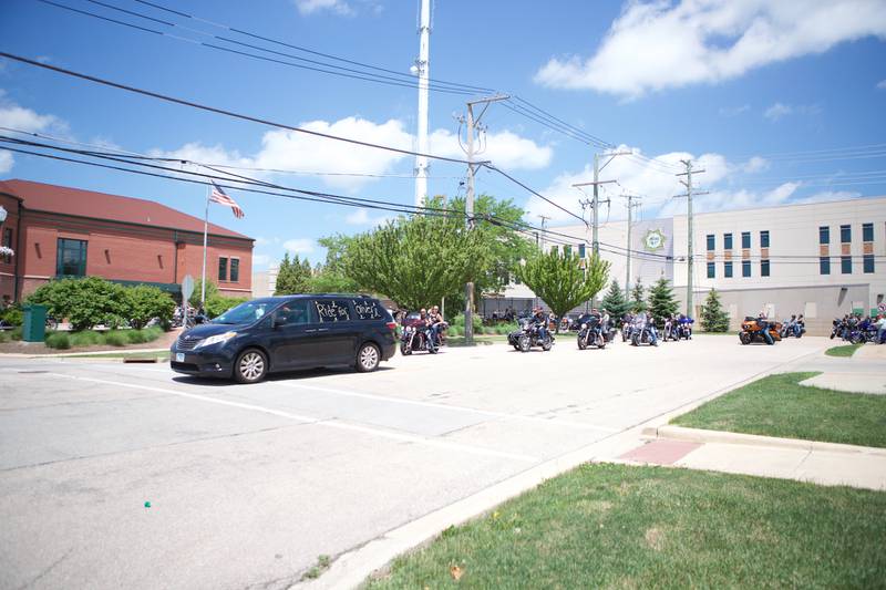 More than 100 motorcycle riders leave from Sycamore Public Library on Sunday, June 22, 2025. The group and law enforcement escorted Sycamore 2-year-old Oliver Olinger to the St. Charles Motorcycle Museum to celebrate Olinger's cancer remission.