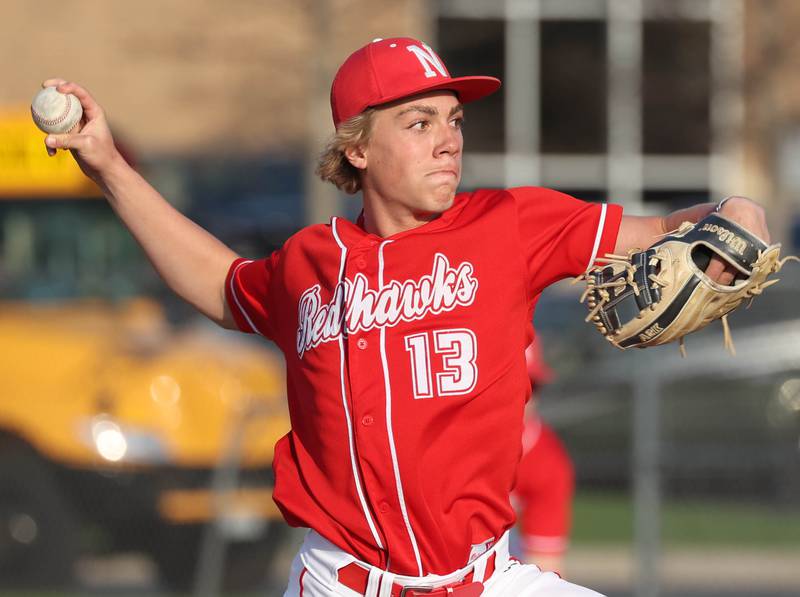 Naperville Central's Ryan Marker delivers a pitch Monday, April 28, 2025, during their game at DeKalb High School.