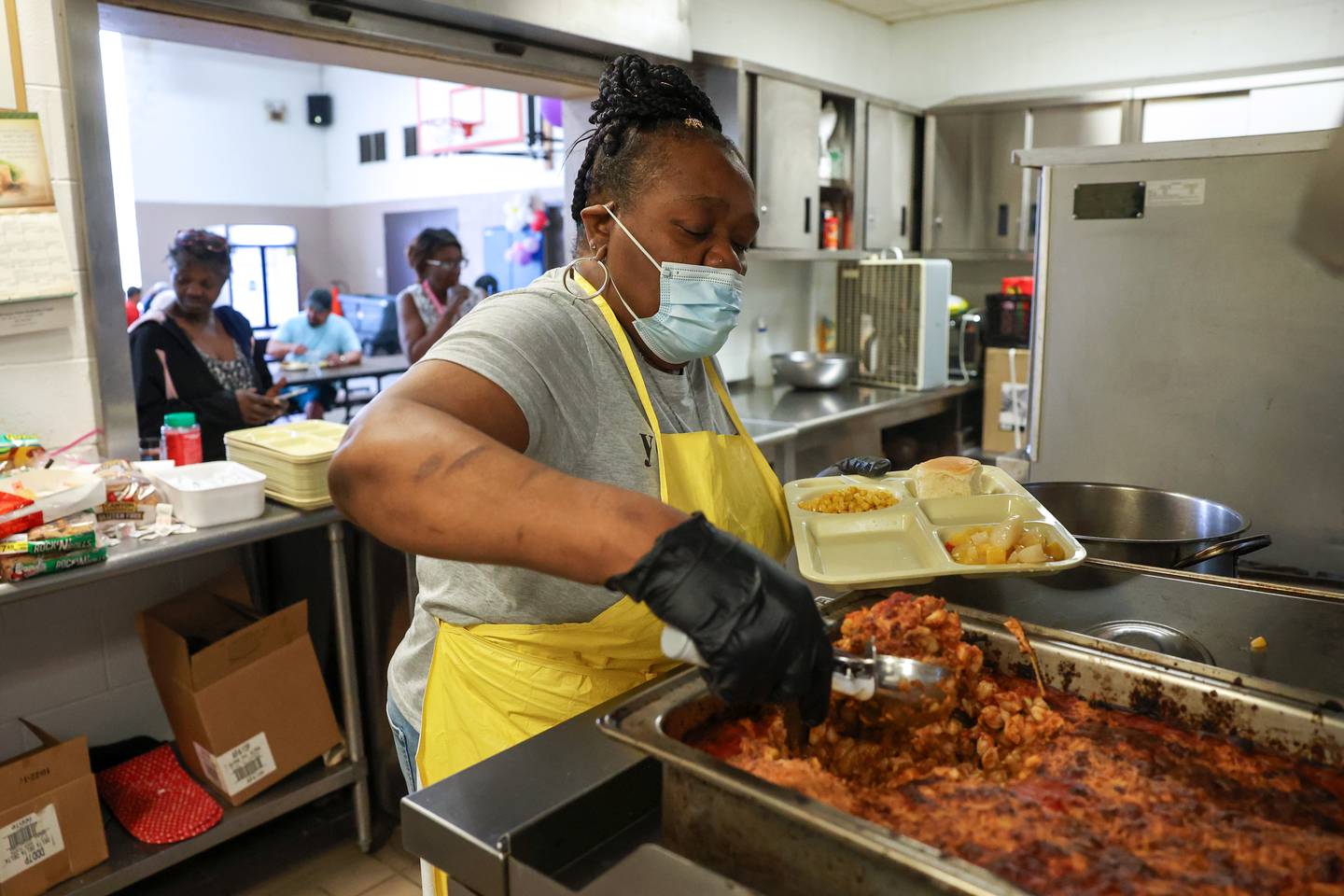 Marilyn Brown, of Kankakee, serves lunch for individuals in need at The Salvation Army in Kankakee on Tuesday, June 10, 2025. The local branch is facing a severe funding shortage, prompting Lt. LaToya Surratt to start a summer fundraiser in hopes to collect enough to maintain services.