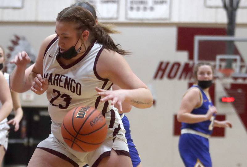 Marengo’s Morgan Coffman works under the basket against Johnsburg during girls varsity basketball action in Marengo Thursday night.