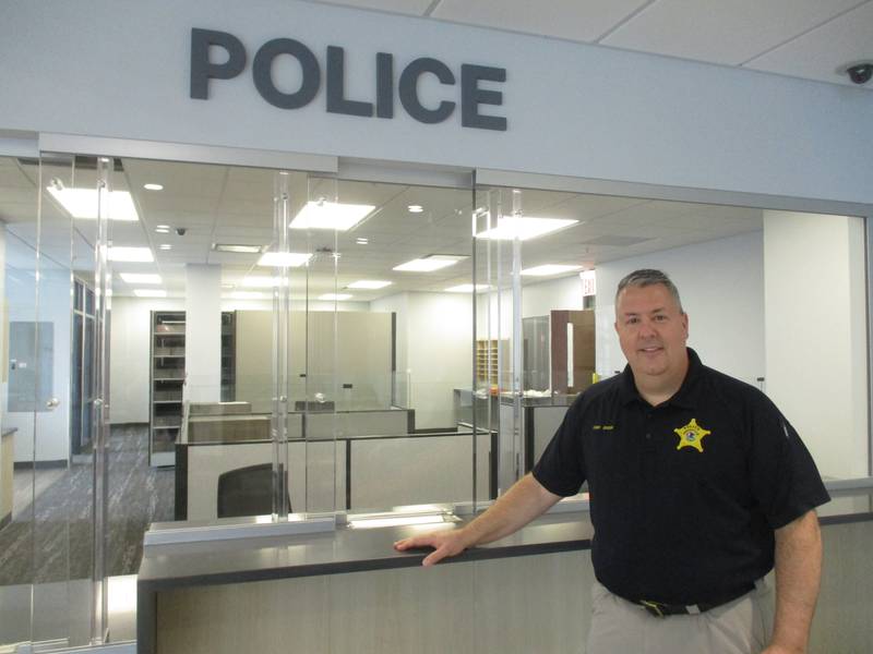 Yorkville police Chief Jim Jensen stands at the public reception area in front of the police department's Records Division inside the new Yorkville City Hall at 651 Prairie Pointe Drive. He is seen here on April 11, 2023 during a tour of the new headquarters.