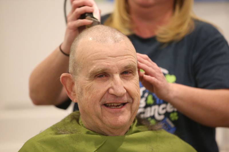Mike Brown has his head shaved during the 18th annual Illinois Valley Emergency Services St. Baldrick's event on Sunday, March 23, 2025 at Senicas Oak Ridge in La Salle.
