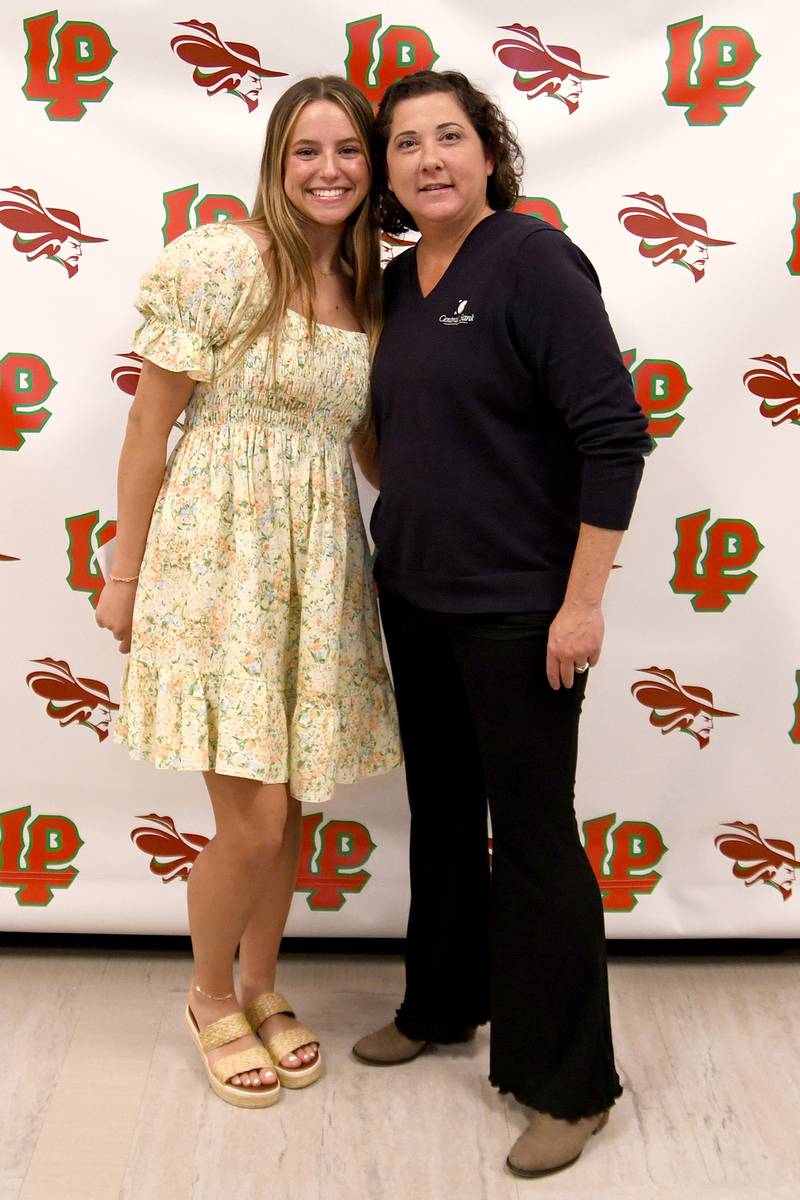 Isabelle Andrews (left) received the Central Bank Illinois Scholarship. This scholarship is awarded to an L-P senior who has a minimum 3.0 cumulative GPA after seven semesters and has been accepted to a two- or four-year college. The scholarship was presented by Jennifer Konczak.