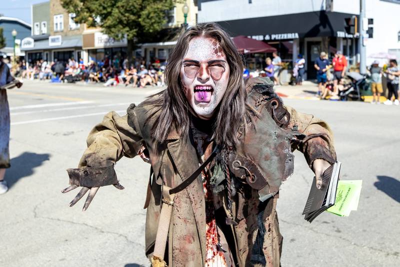 A zombie from The Nightmare Haunted House adds some frightening fun to the Grundy County Corn Festival Parade in Downtown Morris on Sept. 28, 2025.