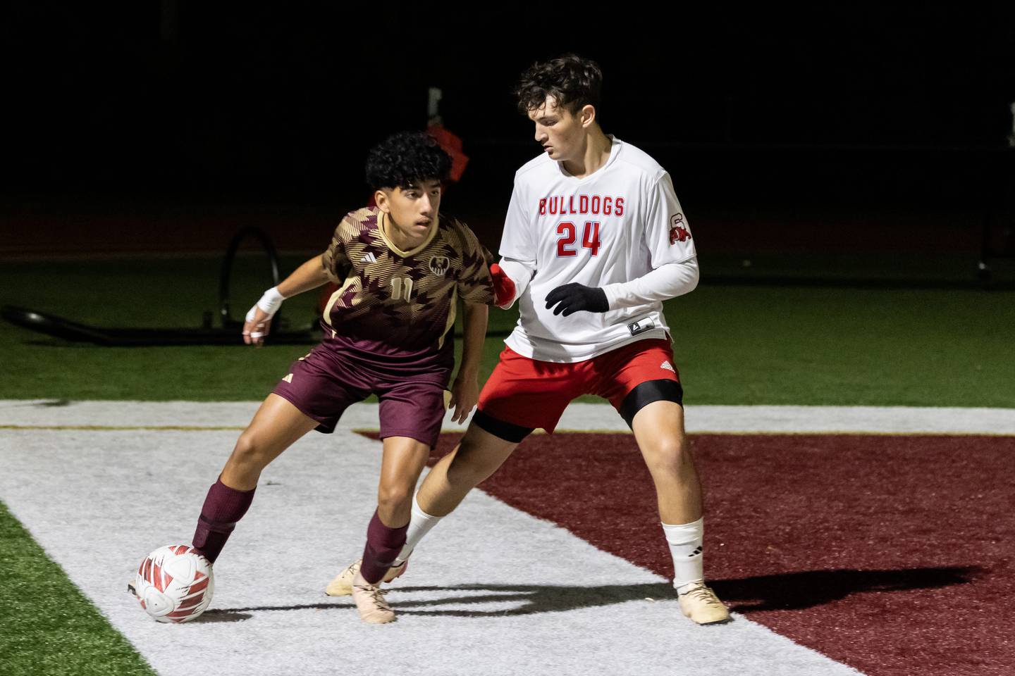 Morris's Sebastian Serna and Streator's Keegan Gassman fight for control of the ball during a varsity soccer game at Morris on Oct. 15, 2025.