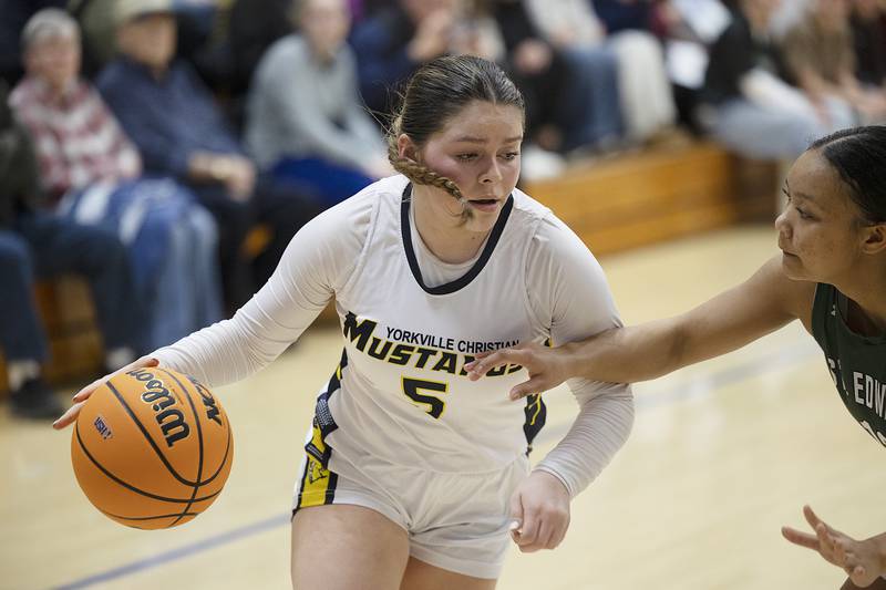 Yorkville Christian’s Hannah Aguado drives to the hoop against St. Edward Tuesday, Feb. 25, 2025, in the Class 1A Sectional at Hinckley-Big Rock.