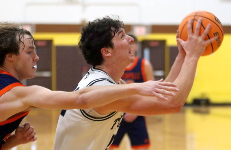 Cary-Grove’s Adam Bauer heads for the hoop against Naperville North in varsity boys basketball Hinkle Holiday Classic action on Monday, Dec. 21, 2025, at Jacobs High School in Algonquin.