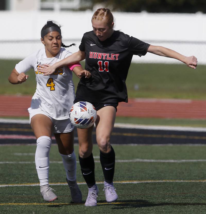 Jacobs' Sam Diaz and Jacobs' Ava Nisi battle for control of the ball during the IHSA Class 3A Huntley Girls Soccer Regional championship match on Friday, May 23, 2025, at Huntley High School.