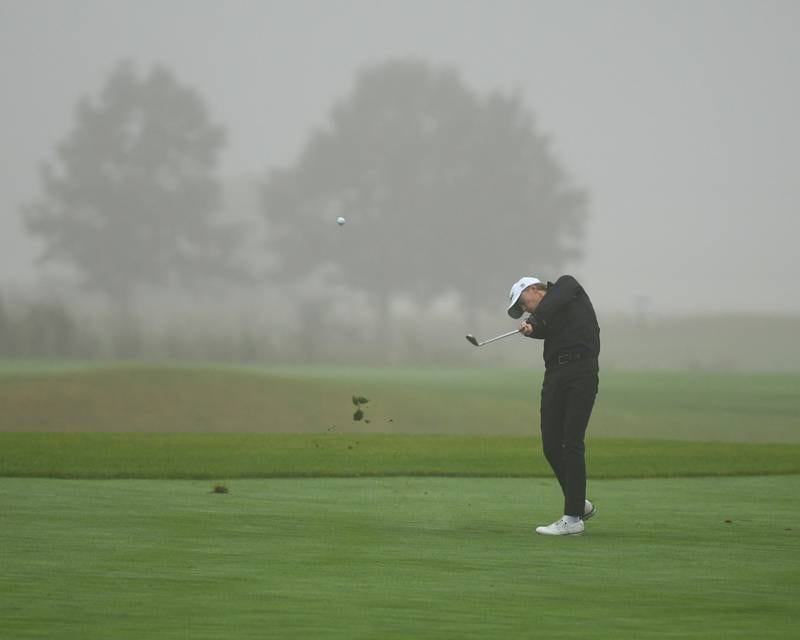 Downers Grove North's golfer Colton Wardolw makes contact with the ball during the West Suburban golf match on Tuesday Sept. 24, 2024, held at Prairie Bluff Golf Course in Crest Hill.